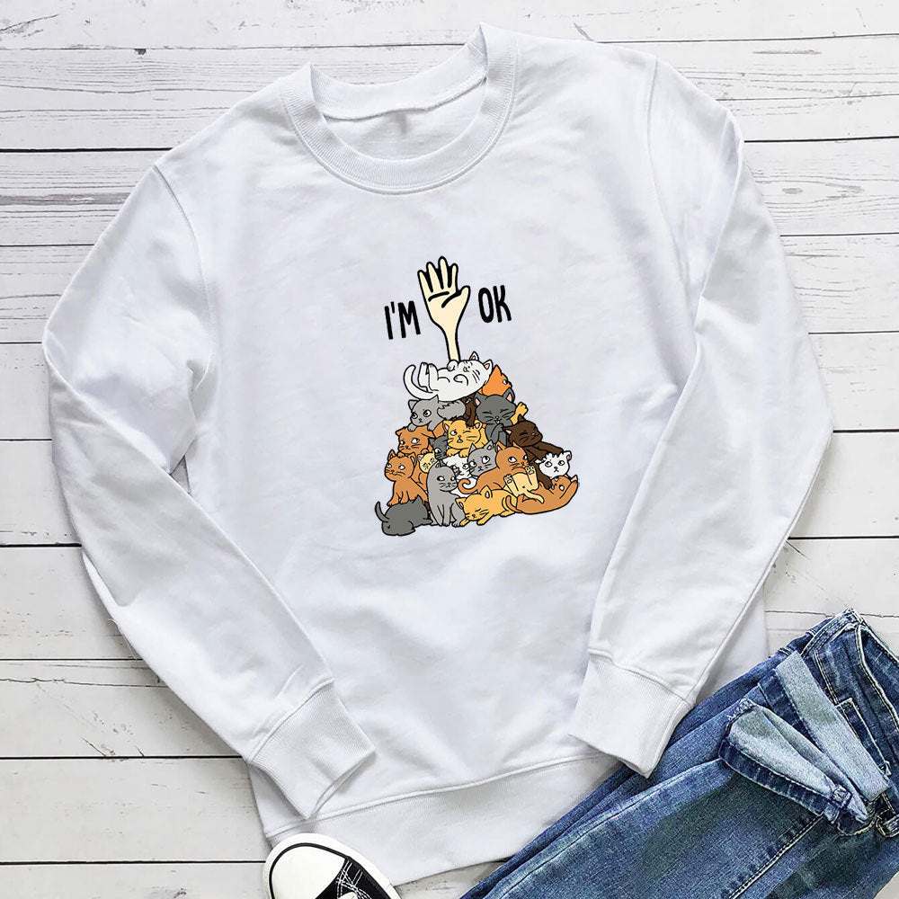 A pile of cat letter printed hoodies